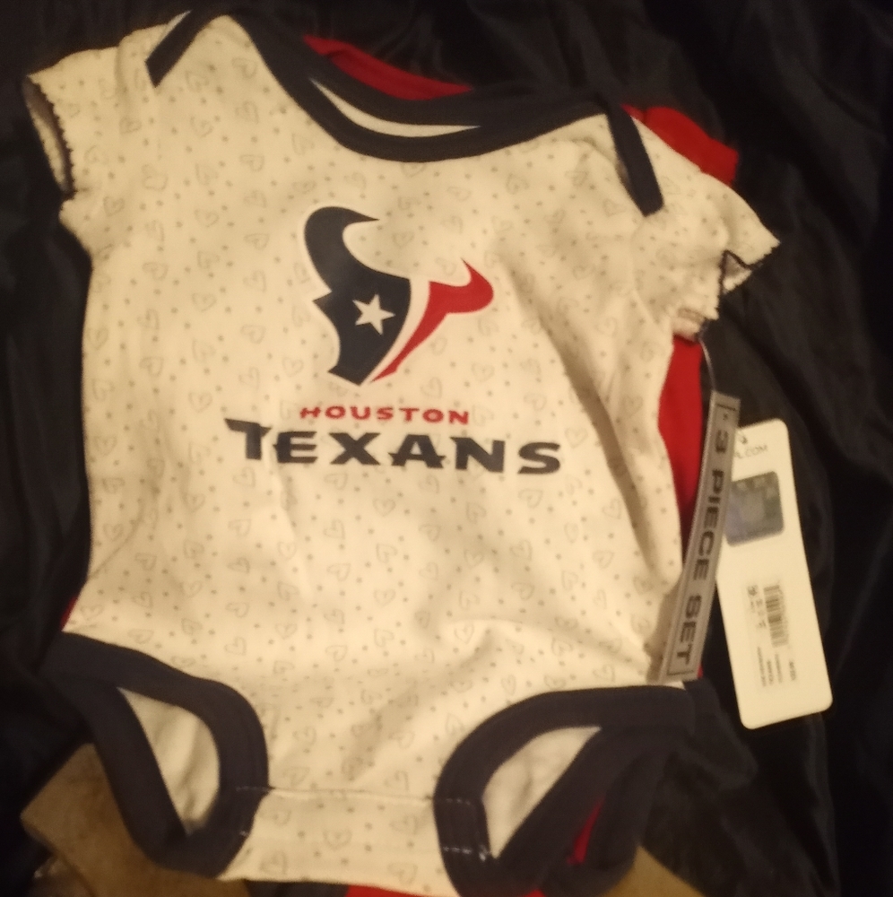 A set of three onesies Houston Texans